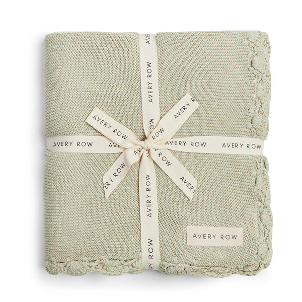 Organic cotton baby blanket in sage green colour with scallop edge