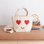 Kids tote back with heart eyes