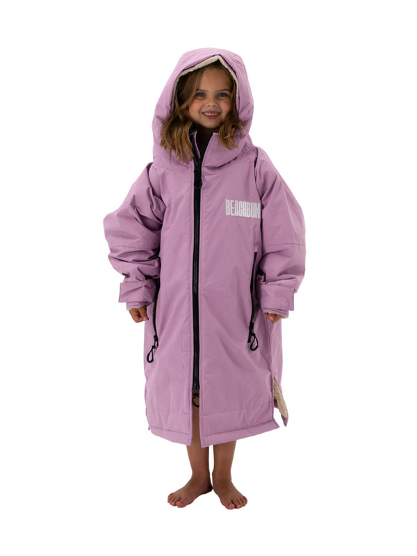 Kids waterproof changing robe in lilac with a sherpa fleece lining and chunky zip front.
