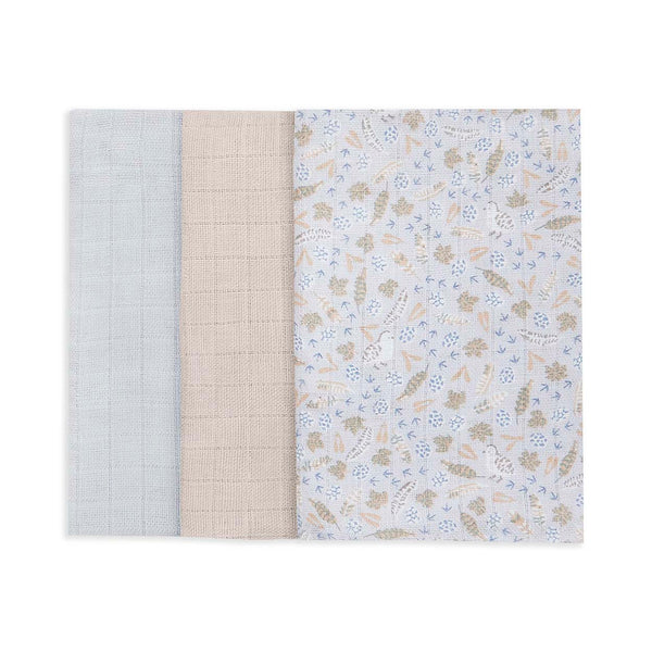 A set of 3 organic cotton baby muslins, 2 in plain neutral colours and one in a neutral nature print
